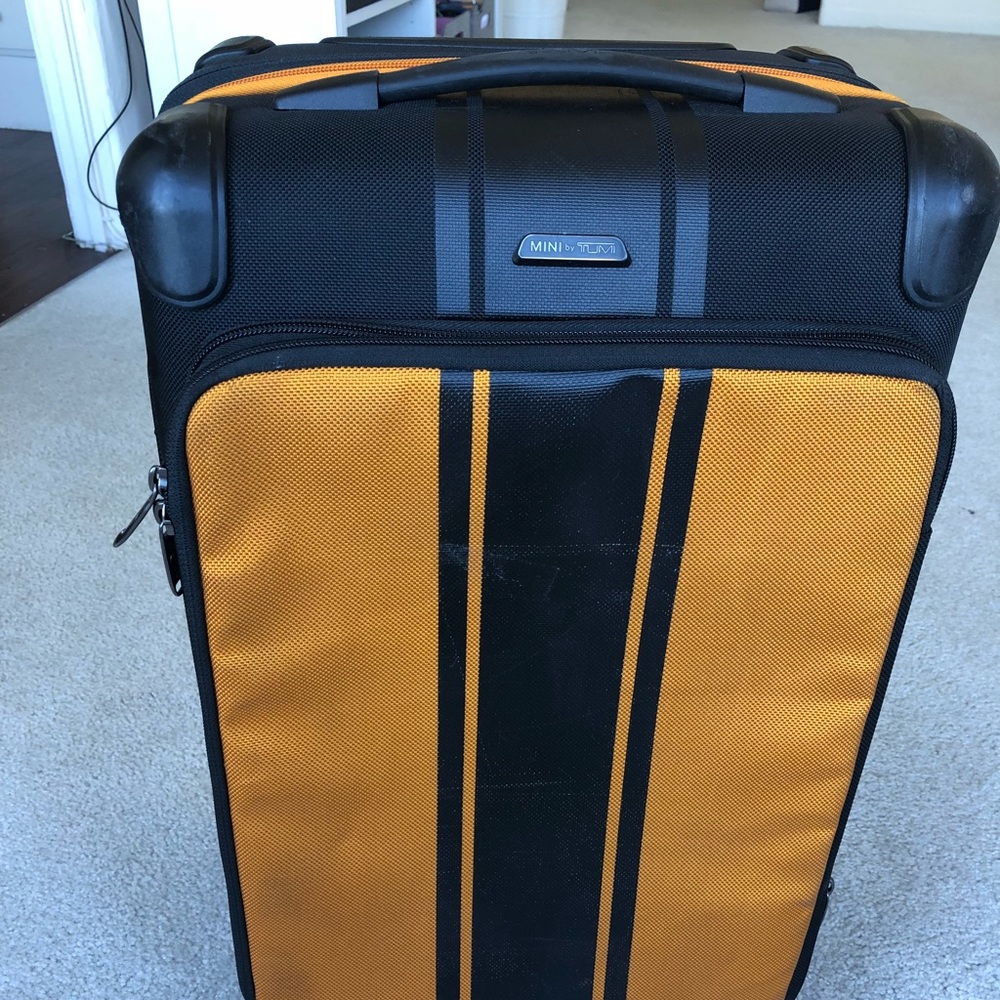 TUMI carry on luggage